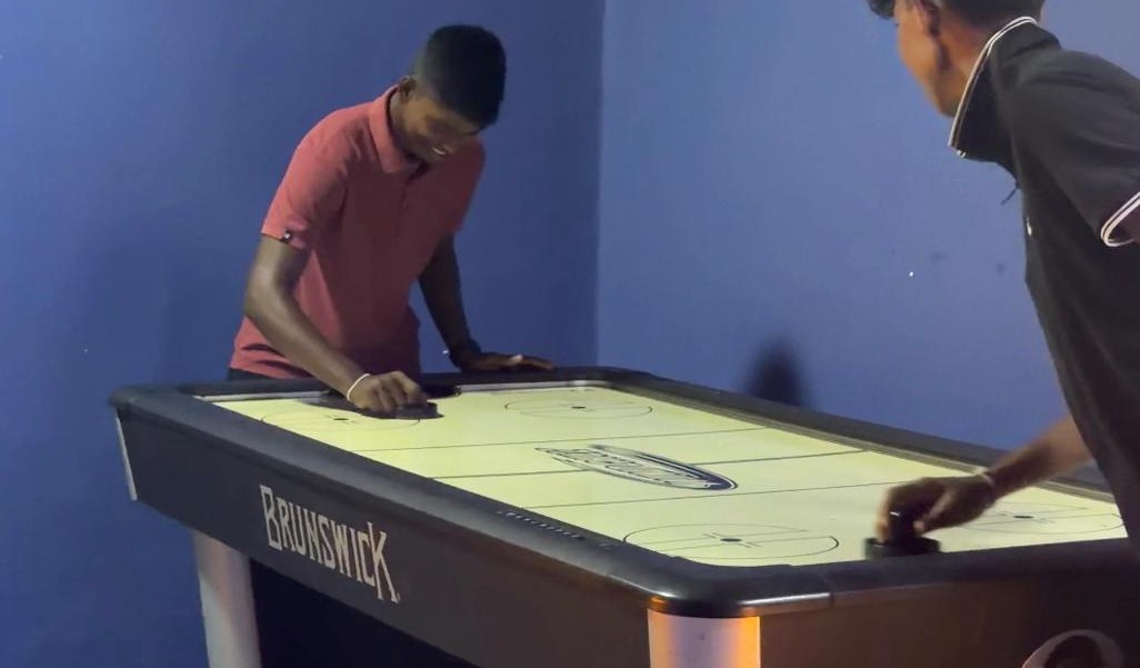 Air hockey at resort game zone